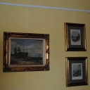 Riel con tres cuadros dorados